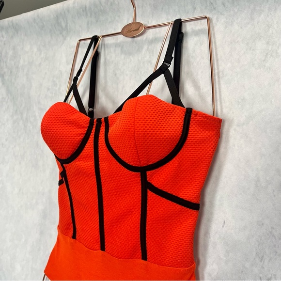 Vibrant Orange & black body suit top w/ geomagnetic black line detail - Picture 3 of 10